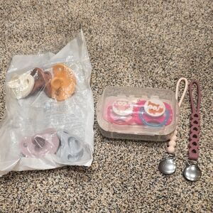 Assorted NEW Pacifers NUK, And Ryan And Rose Clips